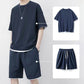 🎉 OFERTĂ LIMITATĂ: 50% REDUCERE! 👕 Set de tricou și pantaloni scurți din tricot tip „waffle” pentru bărbați – țesătură cu efect răcoritor și croială lejeră 💙